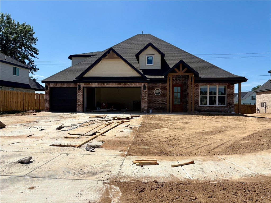Welcome to Tuscany in Centerton! This peaceful neighborhood is just 5 miles from Bentonville and only 11 minutes from the Walmart Home Office. Located less than 2 miles from Bentonville West High School, it's perfect for convenience and top-rated schools. Enjoy community amenities like a pool, clubhouse with gym and kitchen, and a basketball court.Cash Plan with its four bedrooms and two full bathrooms, powder bath boasts so many details that will WOW! The large entry with open stair rail and built in bench welcomes guests and leads them to an open and airy living room. The open kitchen with a large island makes entertaining a breeze. Large pantry hidden behind cabinet doors for a seamless wall of cabinetry, walk-in closets, soft close cabinets, shiplap accents and covered patio are just a few of the many extras!