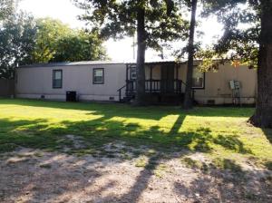 Owner would possibly owner finance; 3 bedroom, 2 bathrooms on a corner lot; house is currently vacant; quick possession; nice yard; 2 car carport; shed; 2 decks; Central Forced Air 5 years old