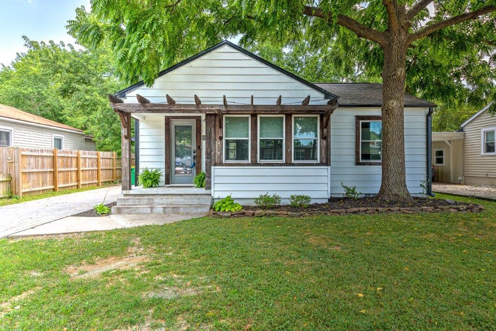 For sale only, home is not for rent. Adorable cottage located in the downtown Springdale entertainment district. Short walk to Northwest Medical Center. Tons of updates which include new Luxury vinyl plank flooring, two year old roof, updated cabinetry, newer double hung Pella windows, newer light fixtures, updated bathrooms & quartz countertops. Electrical & plumbing have been replaced. New sewer line. Gas cookstove. Second living area ideal for office or art studio or could easily be a 3rd bedroom. Laundry located in the sunroom area. Primary suite features two closets with tub / shower combo. Hall bath has tub / shower combo. Private back yard is partially fenced. New hutch in kitchen conveys.