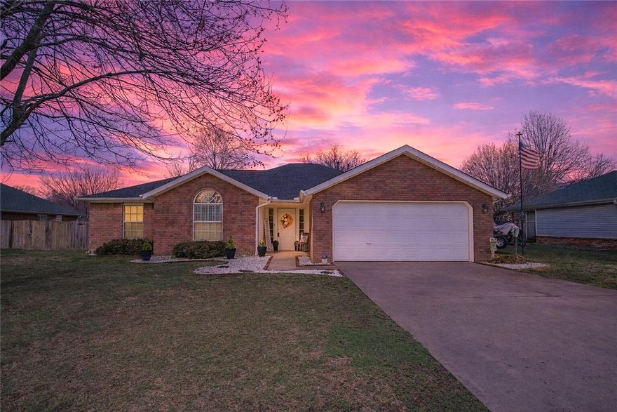 Beautifully maintained home situated in a neighborhood with sidewalks and nearby trails. This home offers a charming small-town feel with everyday convenience. Enjoy close proximity to Creekside Park, local shopping and dining along Highway 62, and quick access to I-49 for an easy commute. Minutes from the Farmington School District. A desirable split floor-plan and durable LVP flooring throughout the main living areas. The open layout provides excellent privacy between the primary suite and secondary rooms, creating both functionality and comfort. Dedicated laundry room complete with a utility sink for added convenience and storage. Enjoy outdoor living in the fully fenced backyard featuring raised garden beds, large mature trees, a covered patio, and plenty of space to unwind. The front yard showcases fresh hardscape, adding inviting curb appeal. Sprinkler system and French drains; front and back of home. HVAC 2025