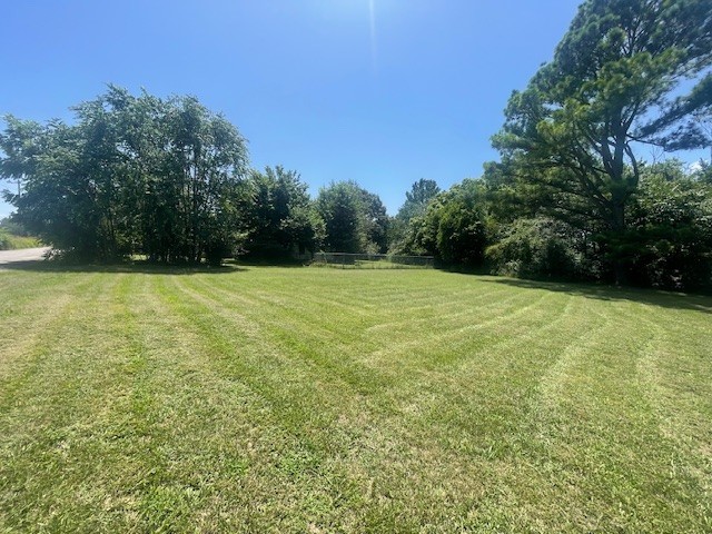 Attention: Home Builders, Developers, Investors. This is a very sought after area for building homes, with four parcels of land totaling 5.17 acres, new estate size homes nearby, and more homes to be built across the street from property in the near future on Roberts Rd. Sewer is soon to be going down Roberts Rd. The property has two houses on it that hold no value. Property is "Sold As Is". Property is approximately 5-6 miles to Bentonville and Rogers. 1.5 miles to Cave Springs.