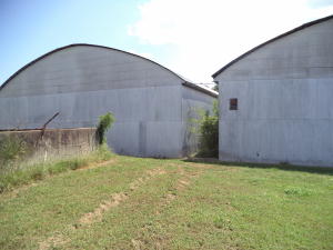GREAT location. Two metal buildings. About 12,000 SF in each one. 30 foot easement into C Street on South side of property.