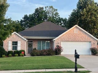 HOME SWEET HOME! This 4 bedrm 2 bathrm home is located min away from schools, shopping, & eateries of Farmington, AR (˜10 minutes from I49, Fayetteville)! This all brick home has been well maintained & boasts curb appeal with front & back landscaping! From covered front porch head inside to a semi-open concept floor plan! Off the main entry, a formal dining rm can be found on the way to the spacious living ro with laminate wood floors, crown molding, & gas log fireplace! Flow into the spacious kitchen feat white cabinetry, subway tiled backsplash, granite counters, stainless steel apps, pantry, & center island with sink + room for more seating! Plus a breakfast nook! Relax & rejuvenate in the primary bedroom with vaulted ceilings, beam details, & private ensuite feat: double sink vanity, separate tub & shower, and walk-in closet! With a split floor plan, you'll find three additional bedrooms and an additional full bath! head out back and enjoy this summer from the extended patio overlooking the fenced-in backyard!