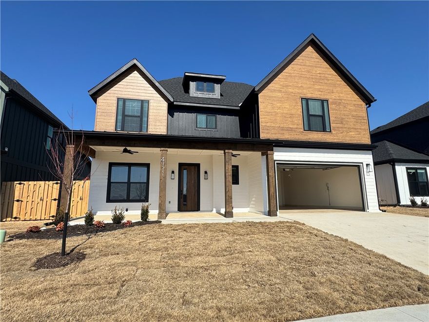 Welcome to your new home in Meadow Brook Subdivision! Meadow Brook is located is the best location in NWA being only minutes to shopping, grocery stores, parks, entertainment, XNA, and much more. Razorback Greenway is only steps away for those walks or bike rides. This beautiful home features 4 bedrooms, 3.5 bathrooms, study, and a 2 car garage. Kitchen is a chefs dream with a large island, built-in oven and microwave, gas cooktop, and open to living room. Primary bedroom is downstairs with soaking tub, walk-in shower, his and hers vanities, & large closet! Upstairs you will find bedrooms 2-4 with 2 full bathrooms. Enjoy the backyard or grill on the large covered patio.