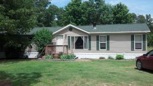 Motivated Seller - Make Offer! Looking for a lot of space for your family at a very affordable price? Here is a 3 bed 2 1/2 bath manufactured home on a permanent foundation in the Bergman school district. Home sets on just over 3 acres, and has a detached work shop. Home is very livable but with just a few cosmetic touch ups could be a real jewel!