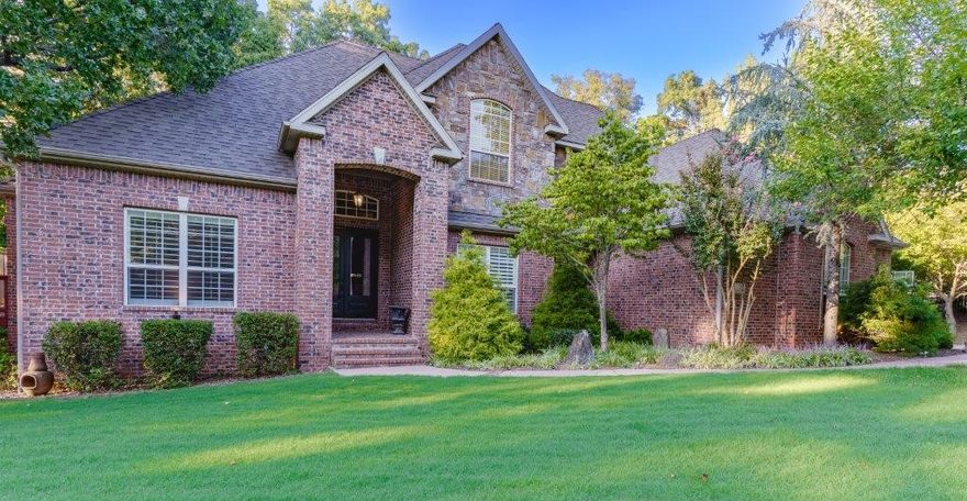 Prime location in Stonehenge Subdivision on quiet cul-de-sac w/quick access to North Bentonville Trail, Bike Playground, Bark Park & I-49. Recently updated 5 bedroom, 4.5 bath home w/oversized 3 car garage. Spacious 3 level home is perfect for entertaining or relaxing with family & friends. Step inside main level to an inviting entry, formal dining, office, & living room w/high ceilings & tons of natural light. Retreat to main level primary suite w/private deck & spa-like bath w/heated floors & heated towel bar, dual vanities, separate custom shower, soaking tub & large closet. Kitchen, casual dining & sunroom are flanked by a wall of windows overlooking back deck surrounded by mature oaks. Upstairs features 3 bedrooms & 2 baths. Walkout basement provides added space for guests w/family room, fireplace, wet bar, exercise room/flex space & 5th bedroom w/en-suite bath. Relax on the ivy-covered private courtyard to sounds of charming water fountain. Beautiful 0.62 acre wooded lot. Home tenant occupied, vacating 11/15.