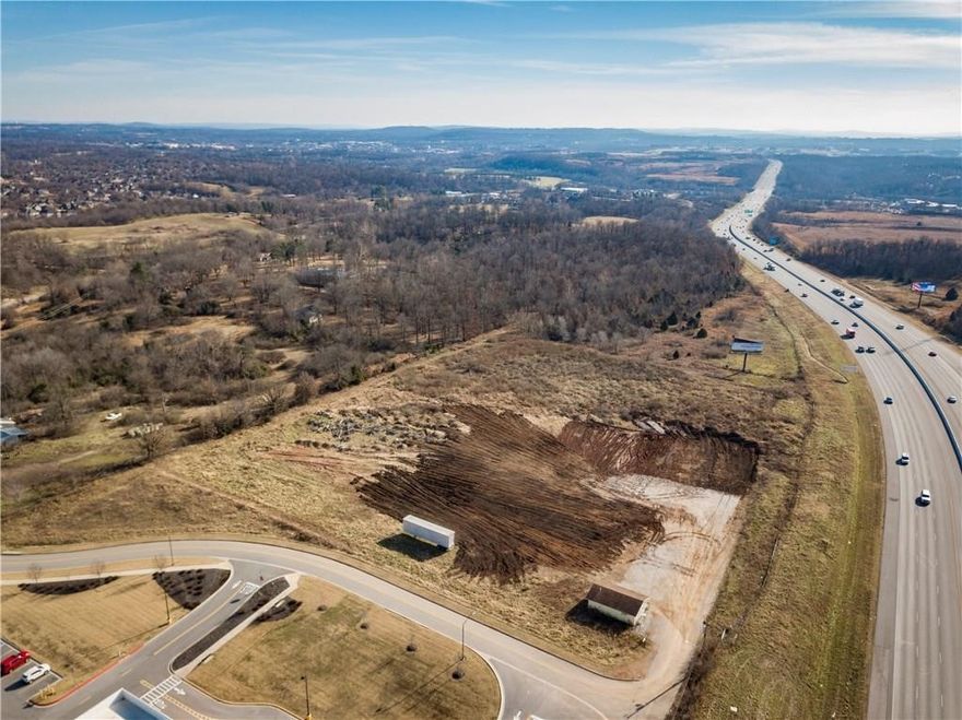For sale is a 7.92-acre parcel in a prime location in Springdale. The property is situated south of Walmart Neighborhood Market, adjacent to Don Tyson Parkway and the Highway 49 corridor. The seller has finalized and secured approval for a mini-storage facility on this parcel. The plans and rights for the facility will be conveyed with the sale of the parcel. Additionally, there is an additional 5 acres that can be negotiated as an extension to the purchase.