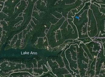 This beautiful, nearly half-acre lot backs up to the Flo-Ride trail and a creek! It is close to many of the amazing amenities that Bella Vista offers, including Lake Ann. The street has a cul-de-sac, so there is very minimal traffic. Electric and water are at the street, but onsite septic is needed. The lot is sloped but buildable, and there are only three other homes on the street as of now, none of which are adjacent to or in front of this lot. Come build your dream home and enjoy all that Bella Vista has to offer!