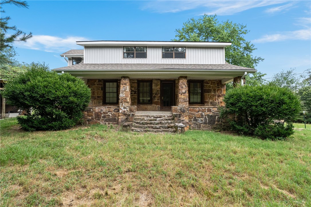 Cute cottage house that has been updated with newer HVAC, roof, water heater, windows, siding. and sliding glass doors. The character of the vintage house has been maintained with the original wood floors and a claw foot tub. This house is set back in the woods, with a level cleared lot, on a paved road. There are 2 wells and a spring, but the house is on public water. Cox high speed internet is available.
Agent is related to the sellers.