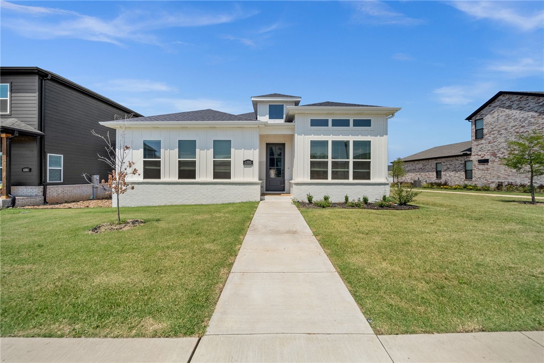 $3k if you use the preferred Lenders & blinds and gutters included! Charming home in the newly developed Aurora neighborhood. Amazing location! Close to everything and Bentonville Schools! Hunter plan boasting 1 level with 4 bedrooms and 3 bathrooms! 4th bedroom could also be a study. Open floorplan, large kitchen and eat-in area. Tons of upgrades in the kitchen! Gas cooktop, quartz countertops, frigidaire pro
series appliances, walk-in pantry and much more. Butlers pantry leading into the formal dining room that's
perfect for entertaining. Wall designs, shiplap accents and more! Brick and hardy concrete exterior with
professional landscaping. Relax on your covered patio area and enjoy being in the perfect home! Aurora
residents have access to TONS of community amenities. Adult pool, family pool, splash pad, bike repair
station, dog wash station, elevate fitness course, sports court open air clubhouse and playground! Front
yard maintenance & internet included in POA!