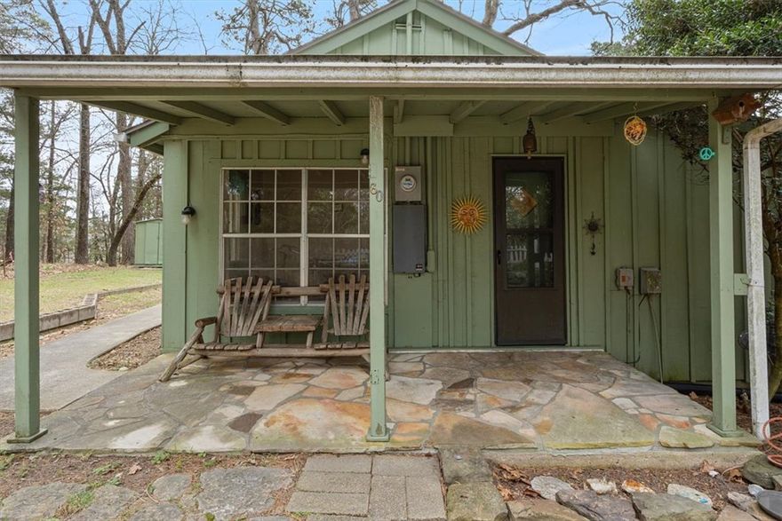 Quaint and cozy 2 bedroom Eureka Springs Cottage located just a short 5 minute walk from all that downtown Eureka has to offer. Location is key with this lovely and tucked away oasis. Perched at the top of Benton Street and just behind the Eureka Springs Community Center is a tiny wooded, dead end side street, with only 3 homes. This is where you can relax and unwind at the end of your day. Whether you intend to use this cottage as a full time residence or just a get away from your regular grind, this pocket of paradise, tucked in the towering pine trees is the perfect escape! This home is certainly ready to embrace its new future. Enjoy it in true Eureka style, as it is, or go all out with a full remodel. Scoop up this little gem and show it how to shine! Opportunities like this are becoming more rare with each passing day, carpe diem. I believe with some good old fashioned elbow grease, a solid plan and a minimal budget that truly impactful upgrades could be achieved with stunning results in this adorable home.