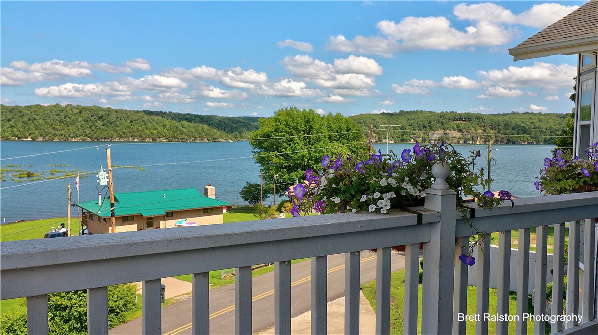 Stunning Home with views of Beaver Lake, from all 3 stories!! Great entertainment space with large family room with wet bar! The home is a 4 seasons water enjoyment property with an indoor pool and hot tub all year round! Private master suite secluded on 3rd floor with stunning private balcony to enjoy view of lake. Commercial refrigerator, gas range, warming drawer, and double oven. Extended RV Parking with power hook up capabilities.