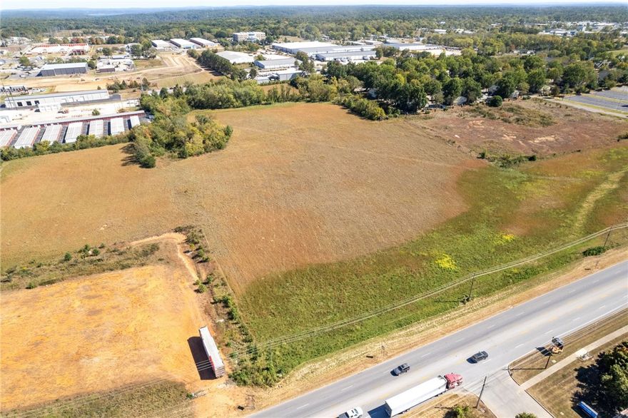 Great development opportunity in North Rogers located in a planning area designated for Urban Neighborhood Growth; allowed zones T4.1, 4.2, and 5.1, mixed-use, and more. It is ideal for Multi-family apartments or many other uses on a great piece of flat cleared land. With water, sewer, and electricity on-site, there is a daily traffic count of 19000 cars, 30K cars a day just north on Hudson Road. 15.65 Acres Flat, mostly cleared acres.