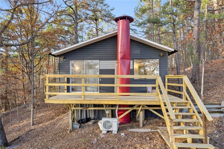 This fully renovated 2-bedroom, 2-bath, 1,232 sq. ft. home sits on a peaceful .79-acre lot near Beaver Lake, where the road literally ends in the water—giving you incredibly easy lake access. With a short walk, you can be swimming, kayaking, or simply enjoying the lake without the lakefront price tag. A rare chance to own a move-in-ready home just minutes from the water. Cash or conventional financing required—don’t miss it!