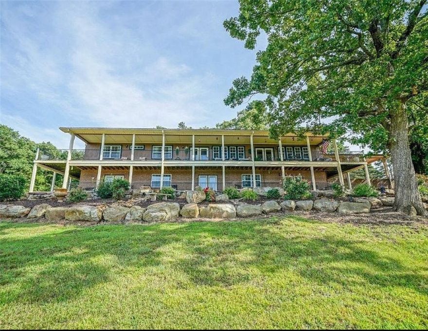 1yr paid membership to Chamberlyne Golf!  Hidden behind an iron gate, this 93± acre luxury estate offers 5,328± sq. ft. living w/6 bed/4 bath. Mostly furnished, this updated 1966-built home blends craftsmanship w/ modern elegance. Open kitchen & dining area feature granite countertops, a chef’s gas stove, the grand living room w/ bronze-tiled ceiling, & electric fireplace. The walk-out lower level is the ultimate entertaining space w/ brick flooring, full kitchen, fireplace, & French doors to a brick patio. The main-level wrap-around deck, enjoy views of Danville & the mountains. Outdoor living w/ a outdoor kitchen, stocked pond, hiking & ATV trails, and 9-hole frisbee course. A 2 story barn w/ guest quarters, detached garage, w/ 550± sq. ft. wine room complete this paradise. The vineyard is ready to be replanted, offering income opportunities as hunting club, short-term rental, luxury event venue.