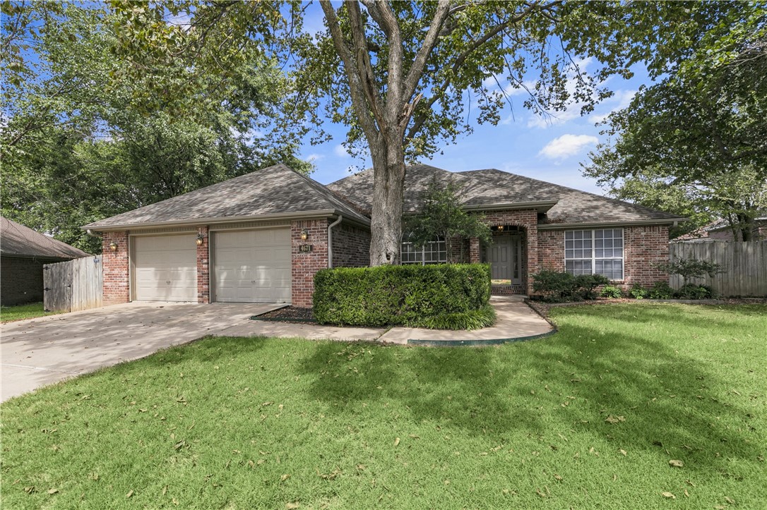 Beautiful and very well maintained home located in an established Springdale neighborhood next to all the amenities! This one level, 3-bed, 2-bath offers the ideal split floor plan tucked away on a cul-de-sac and large back yard. Step inside in a house perfect for entertaining & everyday living with a gas burning fireplace, new carpet throughout, updated light fixtures, its own separate dining space, a spacious living room with plenty of natural light, with new windows, a kitchen and eat-in nook. The Large primary en-suite includes a separate tub, double vanity, shower & 2 walk-in closets. The primary bedroom is strategically tucked away from the rest of the house. This home is already move-in ready while still allowing opportunities to add in your own personal upgrades. The home is located close to all the amenities; 2 miles from I49, 1 mile from Johnson Square, 2 miles from Tyson HQ and 3 miles from Uptown Fayetteville. All just under a 10-minute drive!