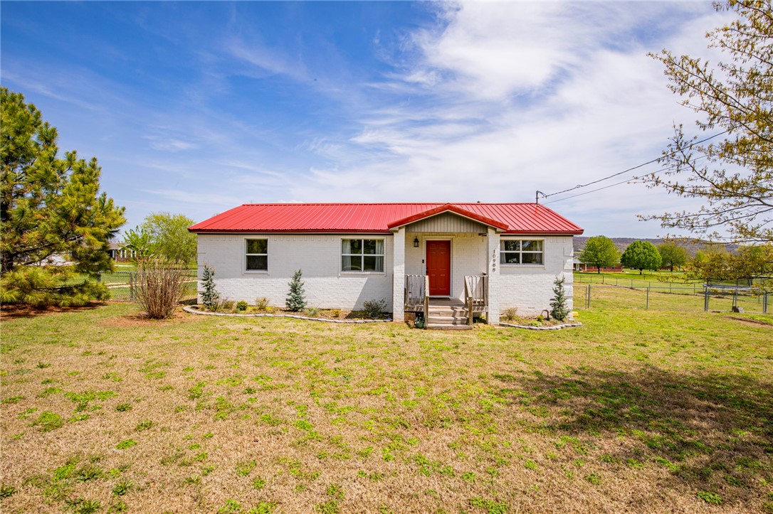 The uniqueness of this home is sure to turn heads. This home was fully remodeled in 2019 and features three bedrooms, two full bathrooms, a .6 acre lot which has a fully fenced backyard. The yard is completely flat, so if you wanted a mini farm or space to entertain you would have it. According to google maps your are only a 18 minute drive to the Fayetteville Square. Be sure to set your appointment to see this tranquil and convenient home today.