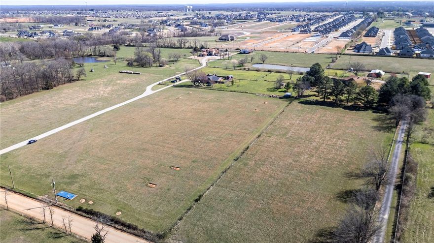 Discover the opportunity to build on 2.00 acres of flat, usable land in a convenient location between Hwy 72 and Hwy 102. Offering a balance of open space and accessibility, this property is well suited for a custom home, shop, garden, or room to simply spread out. Located less than two miles from Bentonville West High School and near Gamble Elementary, Marrs Mercantile, Walmart Home Office, and the future Centerton Community Center, this tract combines a peaceful setting with easy access to everyday amenities. A rare chance to secure a larger homesite in a growing area.
