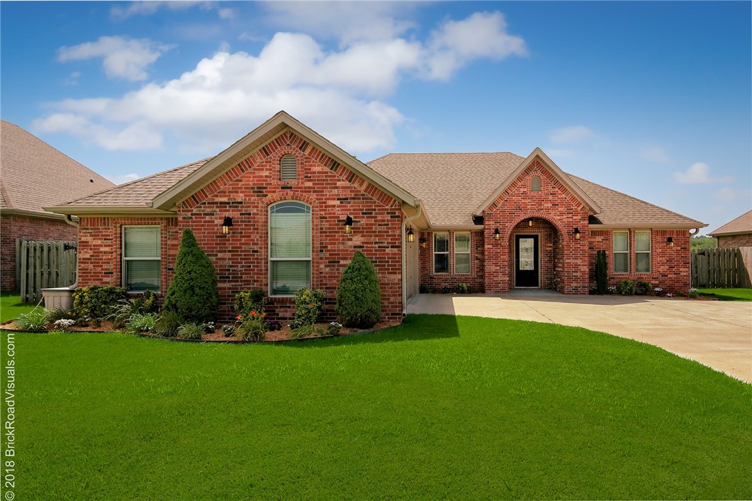 Fabulous three bedroom, two bath home with split floor plan in Crystal Springs subdivision. Easy access to I49. Side entry garage and landscaping add to curb appeal. Backyard is large and backs up to open space. Kitchen has granite counters and stainless steel appliances. Formal dining has wood flooring. Spacious master bedroom with trey ceiling and access to back covered patio. Master Bathroom has separate tiled shower and jetted tub.