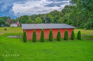 Wanting to build or invest! This is the place. Located in one of Harrison's most desired areas. You can build your dream home or can be developed with multiple lots for horses or condos! This is a must see that currently has a insulated shop with electric that can be whatever you need! Call today and take a look!