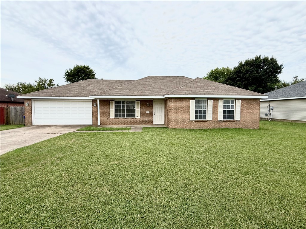 Great home in Lowell. Just minutes from I-49 and JB Hunt. This 3 bedroom 2 bath features vaulted ceiling in living room that opens into the dining area and kitchen. Large fenced back yard.