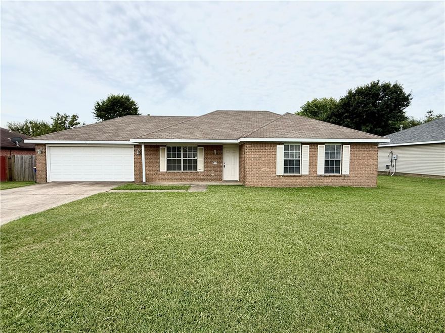Great home in Lowell. Just minutes from I-49 and JB Hunt. This 3 bedroom 2 bath features vaulted ceiling in living room that opens into the dining area and kitchen. Large fenced back yard.