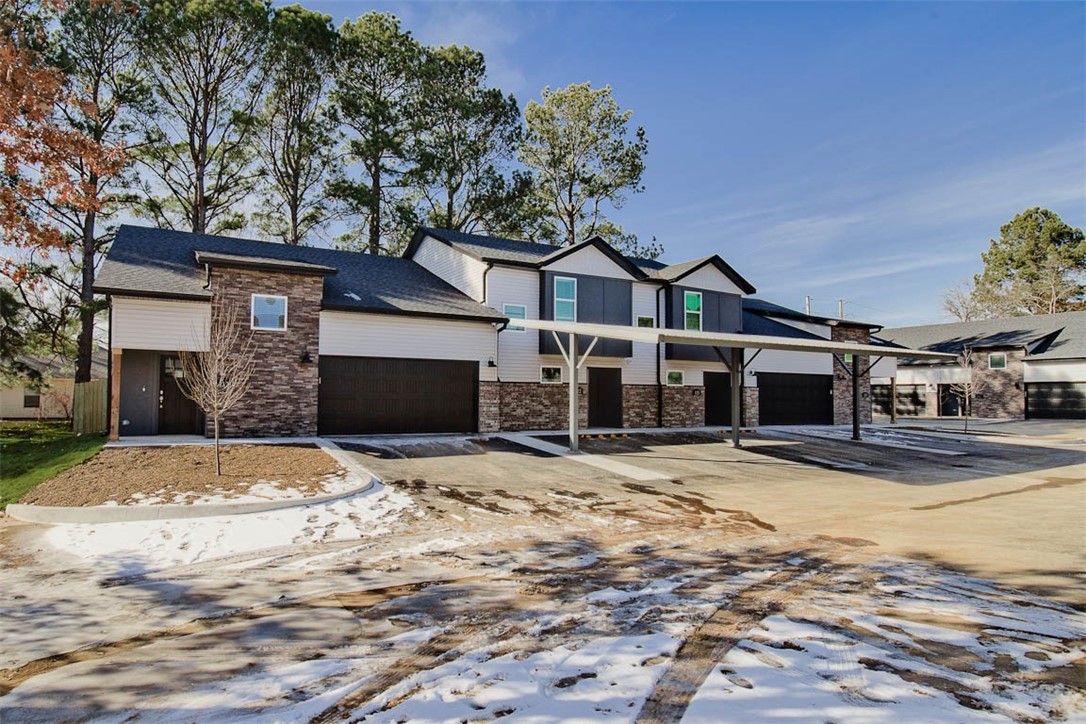 New Construction townhome in perfect Fayetteville location. Close to the University of Arkansas, shopping, trails, I-49 and all Northwest Arkansas has to offer ! 2 beds, 2.5 baths, 2 car garage. Large main floor living area, laundry, 1/2 bath and kitchen. Bedrooms are located upstairs with private baths. Upstairs also has a large storage room over garage. LVP flooring in main areas, carpet on stairs and in bedrooms; ceiling fans in bedrooms and living room area. Kitchen has all stainless appliances. Refrigerator and full-size washer & dryer are included with sale. Bluetooth speaker system in living area and on covered porch; wifi cameras for security. Acreage listed is for total complex not individual units, individual unit acreage TBD by legal desc. Each HPR unit will have $300 annual HOA fees for minor maintenance. Entrances are deeded ingress and egress at 3 separate locations. HOA documentation should be available by March 5 for review. Taxes are estimated and based on what was paid prior to development.