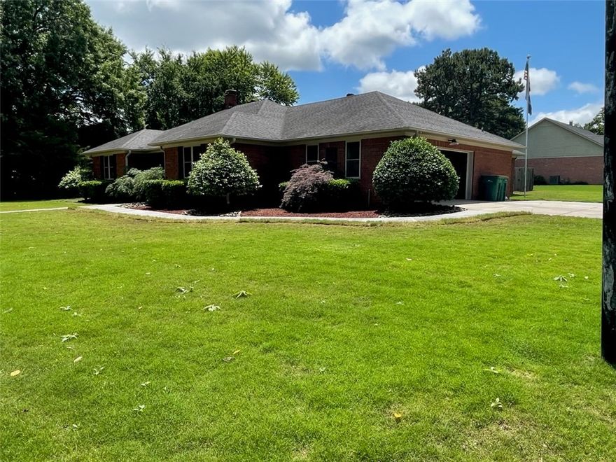 A gem in this popular neighborhood near downtown Russellville.  Spacious home with welcoming foyer and living room featuring natural gas fireplace.  Spacious master is oversized and includes a luxurious master bath with sky light, large soaker tub, walk in shower and heated floors.  Laundry room includes half bath and plenty of extra room for storage or hanging clothes.  Stainless appliances and granite countertops adorn the kitchen for easy serving access.  Three additional bed rooms are of varying sizes share an updated bathroom wih granite countertop, two sinks, shower/tub combo and skylight.  The largest has an extra large closet.  Sunroom and patio are excellent for family gatherings.  Backyard includes 12 X 16 foot shed which was completely rebuilt two years ago.
What's special:
Large corner lot, Emergency generator, Popular neighborhood, Ring security cameras, Coved patio, Lawn sprinkler system, Luxury master bath, Extra parking, Large heated and cooled sunroom and Large yard with room for kids/pets.