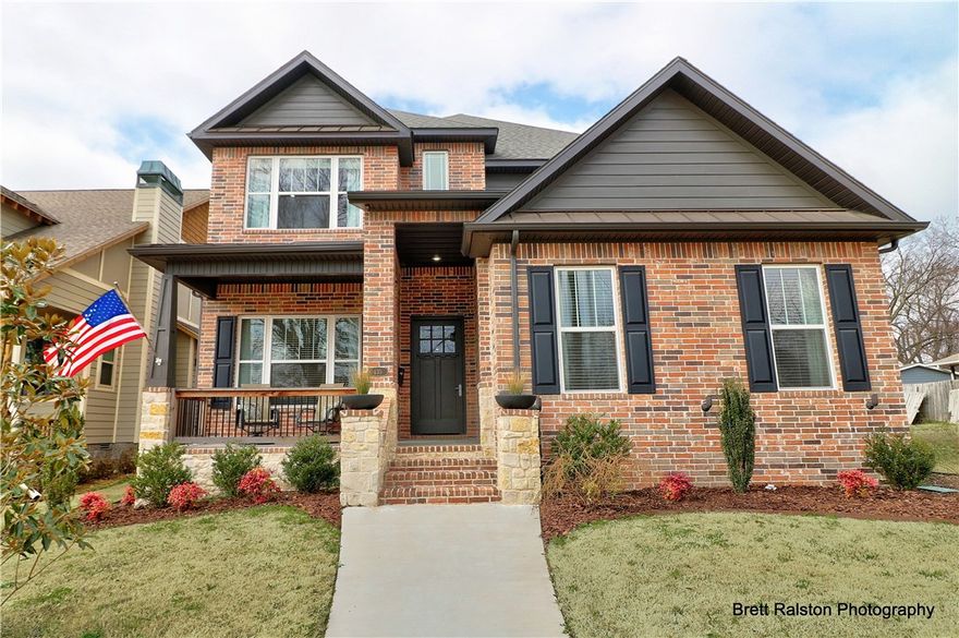 Just a short walk to downtown, the heart of Bentonville, this quality built home offers everything a family could want.  Large living rm open to the kitchen, master bdrm & 2nd bdrm/study downstairs, with bonus and 3 more rooms upstairs.  Second washer/dryer hookup upstairs.  Three car garage, fenced backyard.  The custom quality shows and has been very lightly lived in!  Lots of natural light, tons of storage, and a kitchen that is a chef's dream with gas cook top, double ovens and a walk-in pantry.  Trail head is just steps away! Come see what downtown is all about!