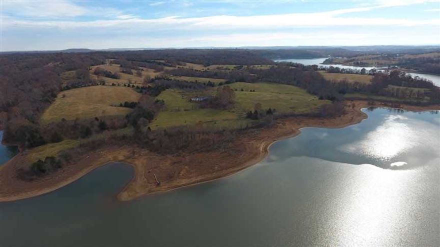A unique and rare opportunity to acquire 610 contiguous acres in one of America&#x2019;s Best Places to Live! The property is less than 2 miles by paved road from Hwy 412 providing easy access to Fayetteville, the University of AR, and multiple international corporations in Rogers and Bentonville. The property has 2 mi of Beaver Lake shoreline - perfect for a residential development, a rancher looking for 400+ ac of pasture, a private estate with access to the lake's 487 miles of shoreline, or a corp retreat.