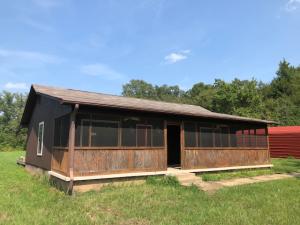 The house we have all been looking for, Great location just mins from town. Two bedroom one bath with a great layout in good condition on over 1.5 acres. Check out the large screened in porch and very nice yard. AND ALL FOR UNDER $80,000! Do not delay this will not last long!