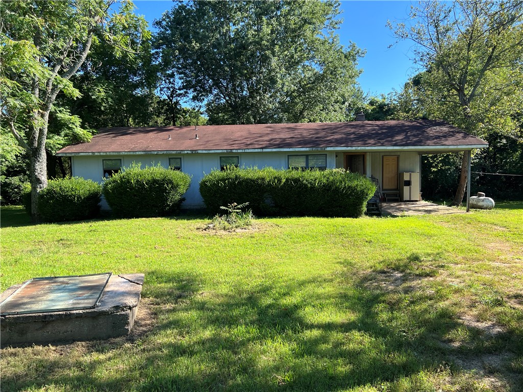 Handyman special!! Come check out this 4 BR, 1.5 BA, house with 1,362 SQFT, 1 car carport, and covered porches. The level 1 acre has large trees, fenced back yard, outbuilding, and water well. If you are looking for a flip house this is one you donāt want to miss. Selling AS IS where is.