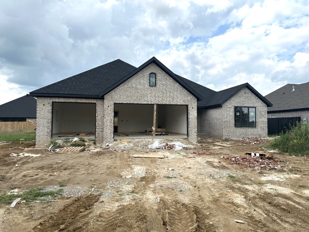 Fabulous is the word for this home! Come out and experience the vibrant South Pointe, the hottest neighborhood in this area! Enjoy $5,000 in concessions and an extra credit from our preferred lender. These homes are eligible for RD. Explore this popular plan featuring 4 bedrooms, 3 full bathrooms, an open living and kitchen area, vaulted ceilings, stylish custom cabinets with a gas cooktop, granite countertops, upgraded lighting fixtures, and engineered hardwood flooring in common spaces.The community has a pool, playground and park. Discover easy access to NWA's attractions like Arvest Ballpark, Tontitown Winery, various restaurants, and just a 10-15 minute drive to I-49. Don't miss out, schedule your tour today!