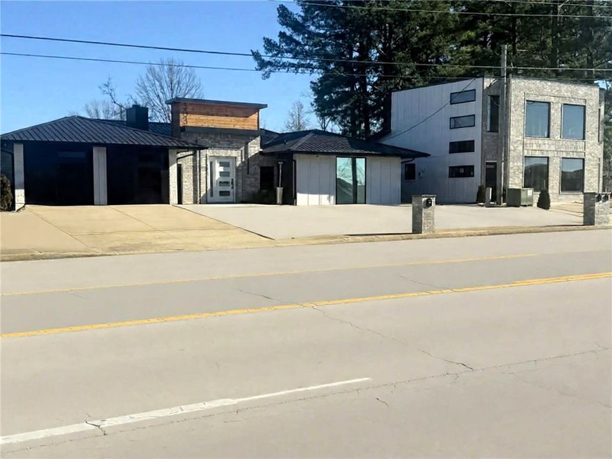 Calling all savvy investors and business owners. Exceptional opportunity on S. Promenade
Blvd with 2 structures on 1.05 acres strategically positioned in high-traffic retail area next to bike trail
with strong national and local tenants. Outstanding visibility with approximately 40,000 vehicles per day, delivering excellent exposure for retail, bike shop, coffee, office or mixed-use concepts. Location offers powerful synergy surrounded by major anchors including HomeGoods, Marshalls, Lowe’s, Home Depot, and Whole Foods. Razorback Greenway Trail runs along the south side of the property, providing rare pedestrian, cyclist as well as vehicle visibility. The site includes approximately 1.05 acres of vacant,
developable land with flexible layout options, ample parking, and multiple opportunities for prominent
pylon signage. Located near major thoroughfares with strong ongoing commercial growth, this property
presents a rare chance to establish or expand in one of the area’s most dynamic retail destinations.