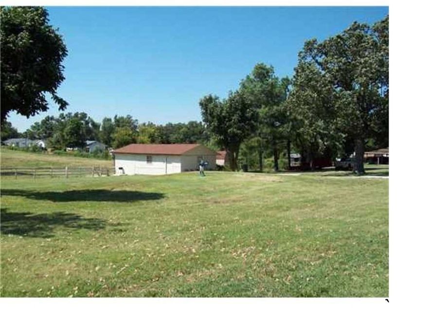 Agent owned.Presently zoned agri, front parcel must be zoned commercial. High visibility frontage from 1-49 & frontage on 48th St. Excellent commercial location 
between 412 W & Elm Springs Rd. Existing structures sold "As-Is" & there are no warranties on the buildings,systems or equipment. Recommend a demolition of structure. 
One mile from the NWA Childrens Hospital and the Naturals ballpark. A short walk to the outlet mall, less than one mile to Sam's, the New Mercy Hospital, Wal Mart and McAdoodles.