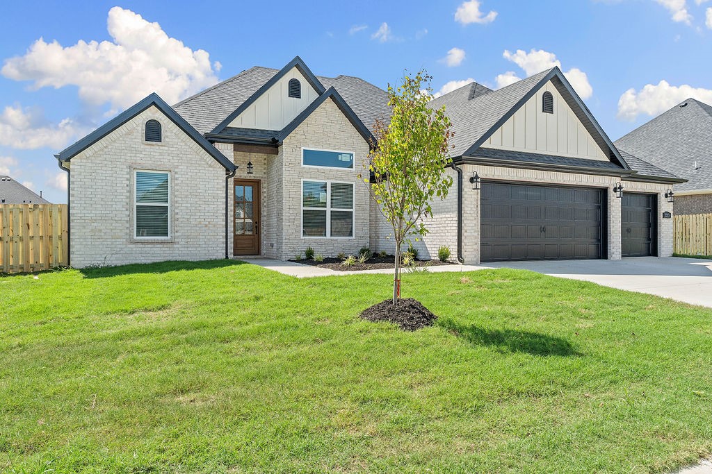 Welcome to the Gary plan offers a open-concept living area that boasts a split floor plan, placing the master suite on one side of the home for added seclusion. All bedrooms are conveniently located on the main level, while the upstairs features a spacious bonus room with its own bathroom. At the front of the house, you'll find a dedicated office.The primary bedroom is a true retreat, featuring exposed ceiling beams and a luxurious ensuite adorned with decorative tile throughout. This ensuite also connects to the utility room for added convenience. To complete the package, the home includes a covered back patio with a cozy fireplace.