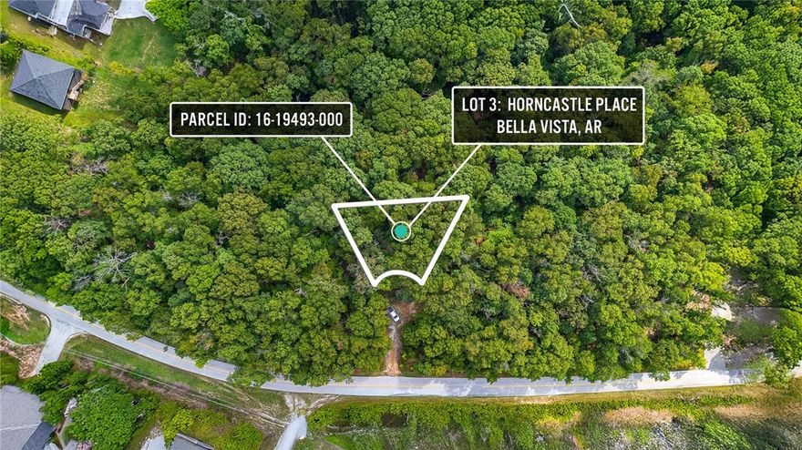 Build your dream home or invest in this .32-acre lot tucked away in a quiet cul-de-sac on Bella Vista’s desirable east side. This property is gently sloping and very buildable and is located within the sought-after Bentonville School District. Outdoor enthusiasts will love the location—just blocks from a trail crossing that connects directly to the Back 40 Trail System near Taylor Homestead. Plus, enjoy all that Bella Vista has to offer with 7 private lakes, 7 golf courses, and miles of scenic trails right at your doorstep.
