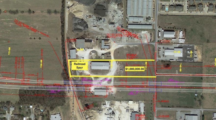 Future 412 Bypass frontage.  Centrally located, railroad spur on property, security gate around frontage.  Perfect for any commercial business needing acreage with an existing warehouse or rail access.  Priced to sell.  Also listed as ML:1107702