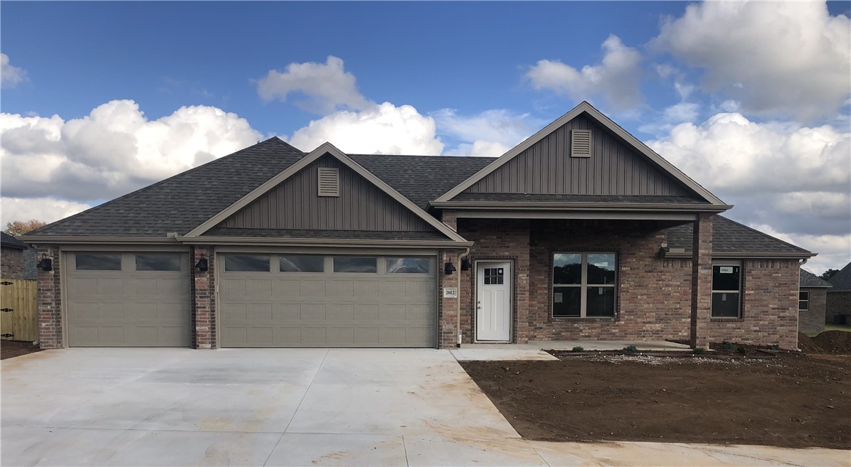 Remarkable new construction 3 bedroom, 2 bathroom single story with 3 car garage home now available. Kitchen is complete w Stainless Steel appliances, gas range, Microwave vent hood, pantry, and granite countertops. Large Fireplace in the living room is the perfect focal point. Details throughout include wood cased windows complete with 2 in blinds. Large front porch, fully sodded oversized yard, landscaping & privacy fence give the home tremendous curb appeal. The back porch is covered & home has fully installed gutters. Keyless pad on garage door for ease of access. Master bedroom has an oversized tile shower. The Master bedroom and closet conveniently wraps around into the laundry room located close to the garage for ease of access. Exterior brick construction creates long life & ease of maintenance. Interior finishes may vary, photos are of similar floor plan
