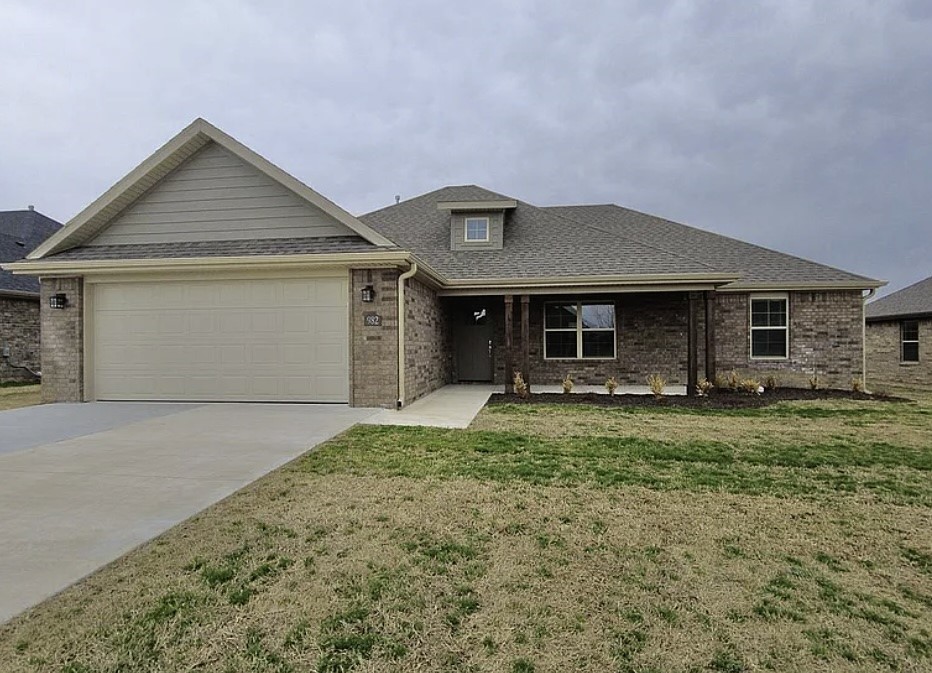 Sold Before Print. Come home to this dreamy new home located in Hickory Meadows in Tontitown! Upon arrival you will notice the wonderful front porch providing excellent curb appeal. This home opens to a large open living space and kitchen area. The well-appointed kitchen shines with custom cabinets, granite counters, stainless appliances and large island. The bedrooms offer generous closet space ideally set up for kid's rooms and/or home office space with shared full bathroom. The master suite boasts a spacious bedroom and bathroom with double-vanity sinks, extra large walk-in closet. And enjoy long hot showers and never running out of hot water with the tankless gas water heater! Last but not least, you'll enjoy summers meeting the neighbors a the community pool with resort-style pavilion and the kids will love the wonderful community playground!