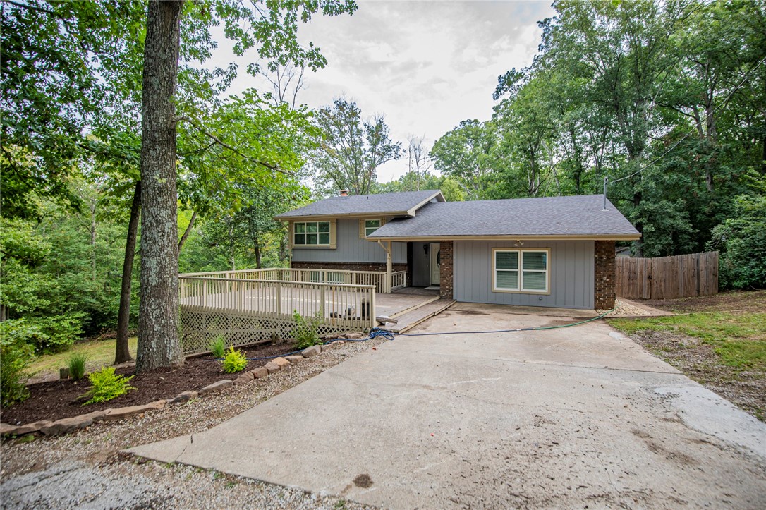 Lovely home with recent cosmetic updates. This home features new interior paint, carpet, new wood flooring, stainless steel appliances, fireplace, 2nd living area or den, and terraced back yard with lots of landscaping. This home has 4 bedrooms and 2 baths and a large front and back deck.