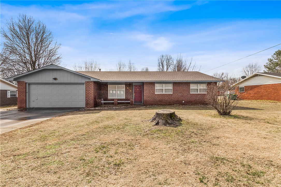 The ONLY owners chose to build their dream home to raise their family on a large lot, surrounded by nothing but farmland and pastures at the time. The bricks used to build this home were made in late 1800's, early 1900's and were originally used for a brick road in Coffeyville, KS. The neighborhood grew up around them to become one of the best centrally located areas in Springdale. After 50 years of living here the original owners have decided it is time for another family to love this home as much as they have. Open your new front door and embrace the memories as you take a step back in time to your childhood on your journey through this home. Formal living area to your left as well as a second living area straight ahead that takes you to the dining, laundry and kitchen area. All bedrooms on other side with master featuring an en-suite with two more bedrooms and a second bathroom. Large fenced backyard for kids and pets and a brand new roof in 2022 adorns the top. The prefect home to raise your family or downsize.