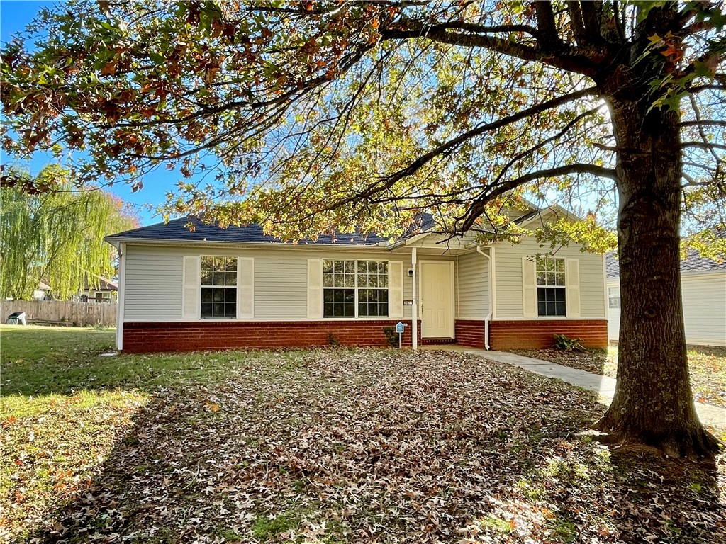 Solid move-in ready West Fayetteville home with three bedrooms & two bathrooms. Brand new tile walk-in shower in the main bathroom. The back patio is in the fenced area off of the garage & is shaded by a large maple tree. HVAC system was replaced three years ago. All of the flooring was recently steam cleaned. No carpet! Refrigerator, washer & dryer convey with the home. You will fall in love with this quiet, estiblished neighborhood & it's beautiful large oak trees lining the streets.