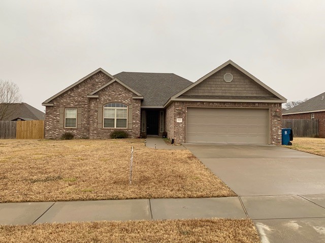Nice 4 bedroom 2 bath home in Bentonville with granite countertops, lots of cabinet and closet space, breakfast bar, large master bedroom & bath, privacy fenced back yard with a covered deck, and much more