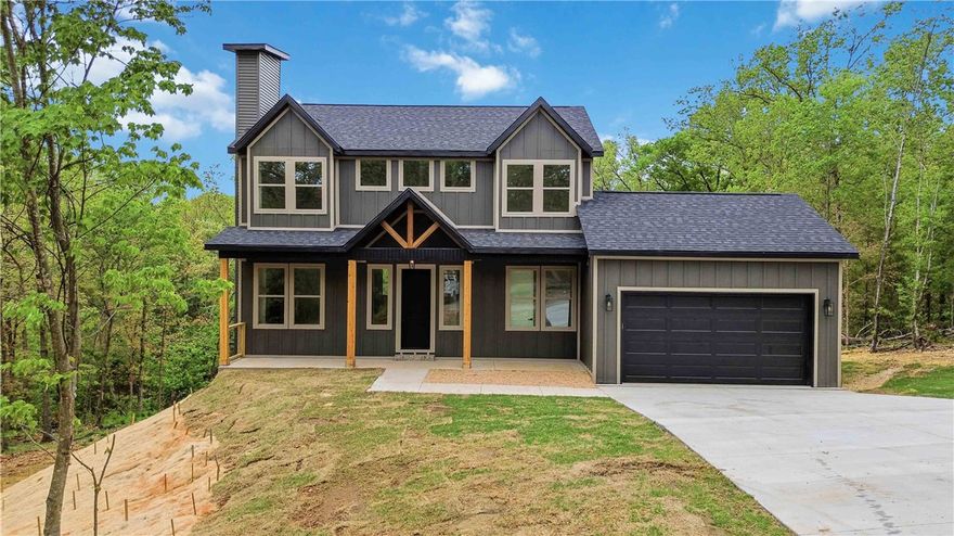 Bella Vista Living | Prime Location | Seasonal Lake Views

New construction in Bella Vista designed for comfortable, full-time living with a strong connection to the outdoor lifestyle. This 2,060 SF home offers 3 bedrooms, 2 full baths, a half bath, and a versatile bonus room ideal for a home office, second living area, or flex space. Enjoy a winter view of Loch Lomond from a setting that highlights the natural beauty of Northwest Arkansas. The functional layout provides easy flow for everyday living, with clean finishes and thoughtfully designed spaces throughout. Located just minutes from Branchwood Recreation Center, The Highlands Golf Course, Loch Lomond, and some of Bella Vista’s best biking and hiking trails. This home offers the perfect balance of modern convenience, location, and livability in one of Bella Vista’s most desirable areas.