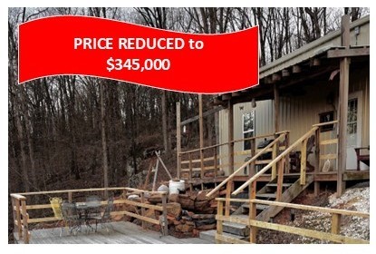 Country living awaits you with this Custom built Barndominium home with large shop area and private 9 Acres +/-. The home features an open concept floor plan with 2 bedrooms, 2 baths, custom kitchen and large living area. Relax at the end of a long day on the porch, patio or deck overlooking the landscape including custom water fountains, striking natural rock formations and a private pond. The 40x50 shop area is fully insulated with electricity and is plumbed for a wood stove. There are two overhead roll up doors with plenty of room for equipment, lots of storage space and even a custom built-in bar area with a 1/2 bath!