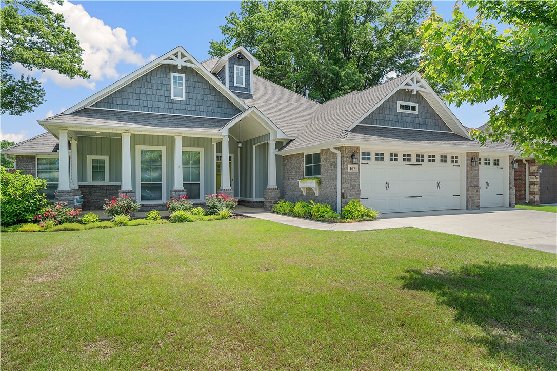 Enjoy this stunning craftsman-style 4-bedroom, 2.5 bath home, with three car garage. Built by Ronald Ragon Homes & located in the highly sought-after Elk Horn Subdivision, this one-level split floor plan is a perfect layout. Step inside to find wood-look tile flooring throughout the main & wet areas, with carpet in bedrooms. The living room features a fireplace with a detailed mantel & wood ceiling beam with natural light pouring through large crank windows. The kitchen boasts modern appliances and a large island. The primary suite offers a walk-in closet, dual vanities, a soaking tub, and a separate glass shower. Enjoy the outdoors year-round with a screened-in porch overlooking the spacious backyard. Neighborhood Perks: Upcoming pickleball court in the subdivision, New disc golf course and expanded bike trails nearby in Pea Ridge. Just 15 minutes to Downtown Bentonville, Rogers, or Bella Vista’s nationally acclaimed mountain bike trails. Wal-Mart drone delivery available in this neighborhood! Tour today