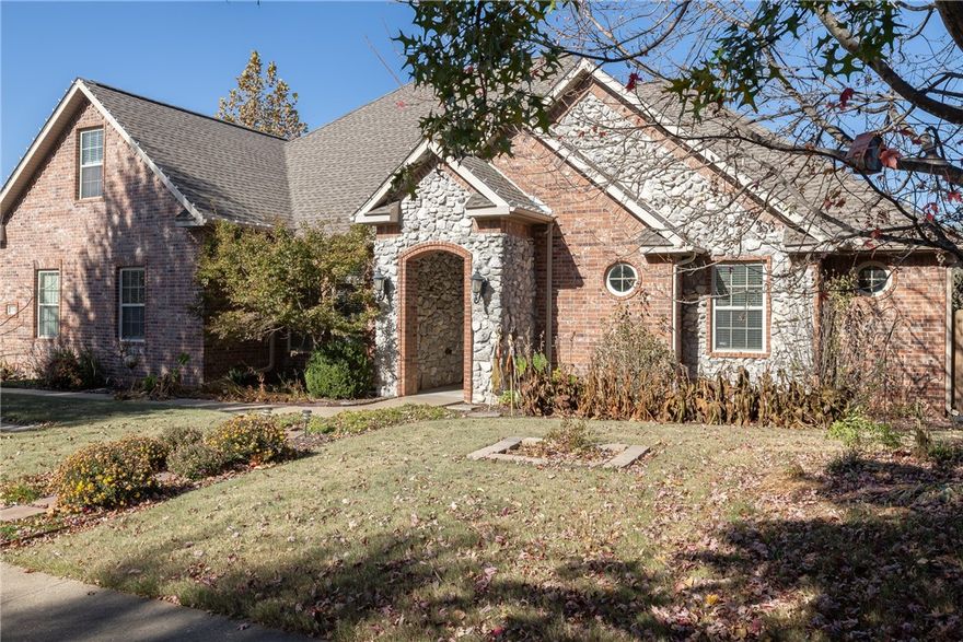 Convenient location close to U of A, I-49, shopping on Wedington or MLK, as well as close to trails and Razorback Greenway. Open floor plan with Primary bed/bath separate from other bedrooms. Primary bath has heated floors, and ADA Accessible shower plus a separate tub/shower. Other bedrooms share a Jack & Jill bath with double sinks. Kitchen has newer granite counters, tile backsplash, and newer appliances. Home has experienced additional extensive updates in past 10 years including new flooring, appliances, mini split in bonus room, new fencing, charger for EV, strawberry beds, fruit trees, a small garden area. Enjoy your own suburban garden of eden with this lovely well maintained home. Atlas above ground storm shelter.