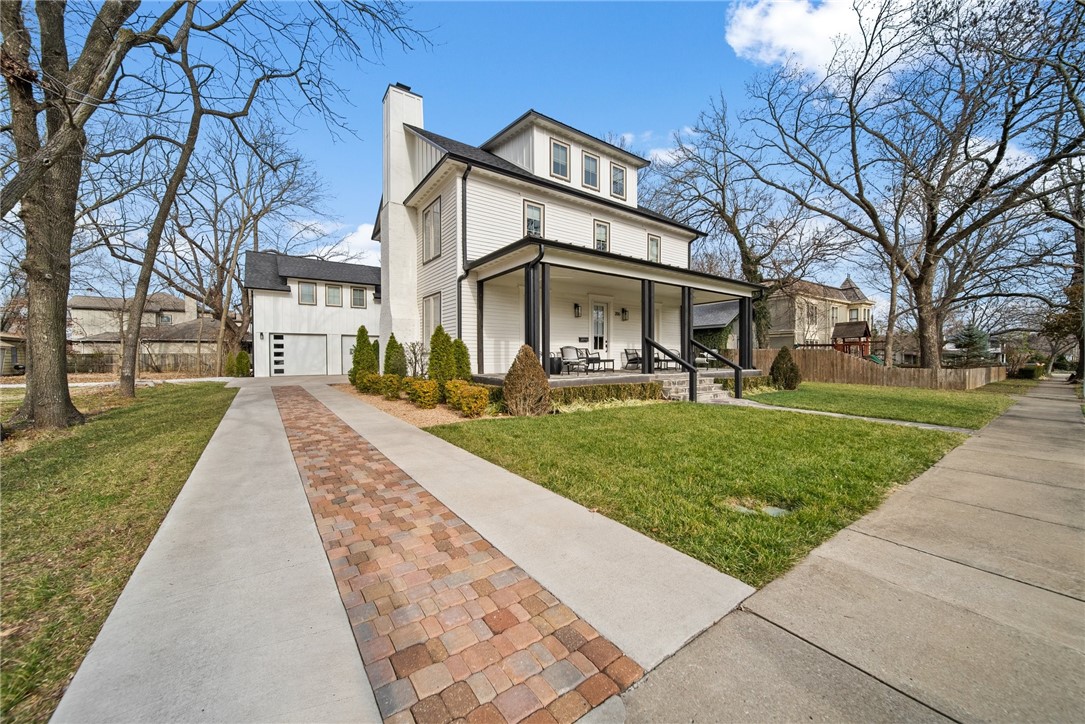 Enjoy the best of Elite Downtown Bentonville in this Original Bentonville 1918 built custom renovated modern farmhouse masterpiece just a few short blocks from the Bentonville City Square! This home has been perfected with updates such as a kitchen remodel with custom flat panel Sapele cabinets, Silestone Calcatta Gold Quartz countertops, plus Wolf and Sub Zero appliances. Main level features Living Room, Formal Dining Room, Kitchen, half bath and Laundry. 2nd Level includes Primary Bedroom and Bathroom, 2nd Bedroom with Ensuite Bath. 3rd Level features Bedroom and Bathroom + bonus space. Garage is attached by a brand new portico and features a 600sf In Law studio apartment. Entire home features wood flooring throughout including new white oak stairs. HVAC was recently replaced with Commercial grade Carrier unit including recirculating air feature. Spacious backyard ideal for entertaining includes extended outdoor patio spaces w/ built-in grill and hot tub plus a detached 23x17 screened pavilion with wet bar!