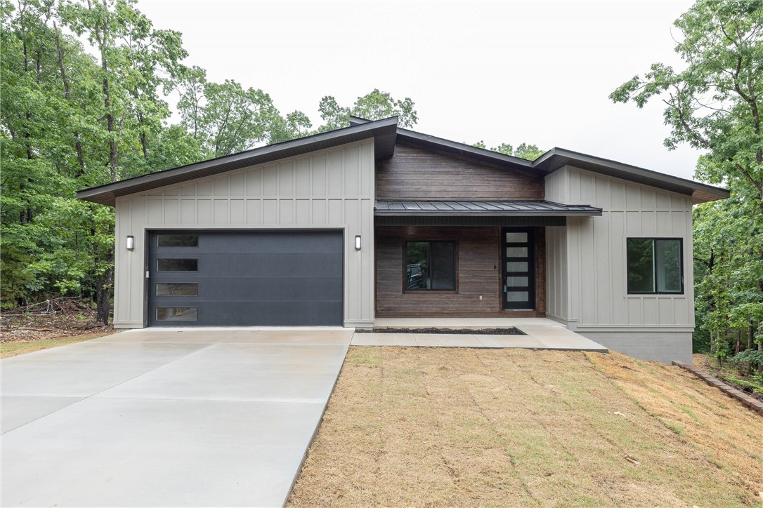 Don't miss your chance to own this beautiful new-construction home! Boasting 3 spacious bedrooms, 2 bathrooms, and 1,667 sq ft of open-concept living, this thoughtfully designed property features stylish fixtures, soaring cathedral ceilings, walk-in kitchen pantry, and energy-efficient ceiling fans throughout. The split floor plan offers both functionality and flair, ideal for modern living. The views and the sounds of the rustling trees from the dinner table and the back deck are breath taking, be sure to check it out. Walk down the steps to the sizeable backyard and peek in the oversized crawl space storage! Nestled in a growing community with easy access to shopping, schools, and recreation, this home is perfect for those seeking comfort, style, and quality craftsmanship. Secure your future home today—schedule a private tour!